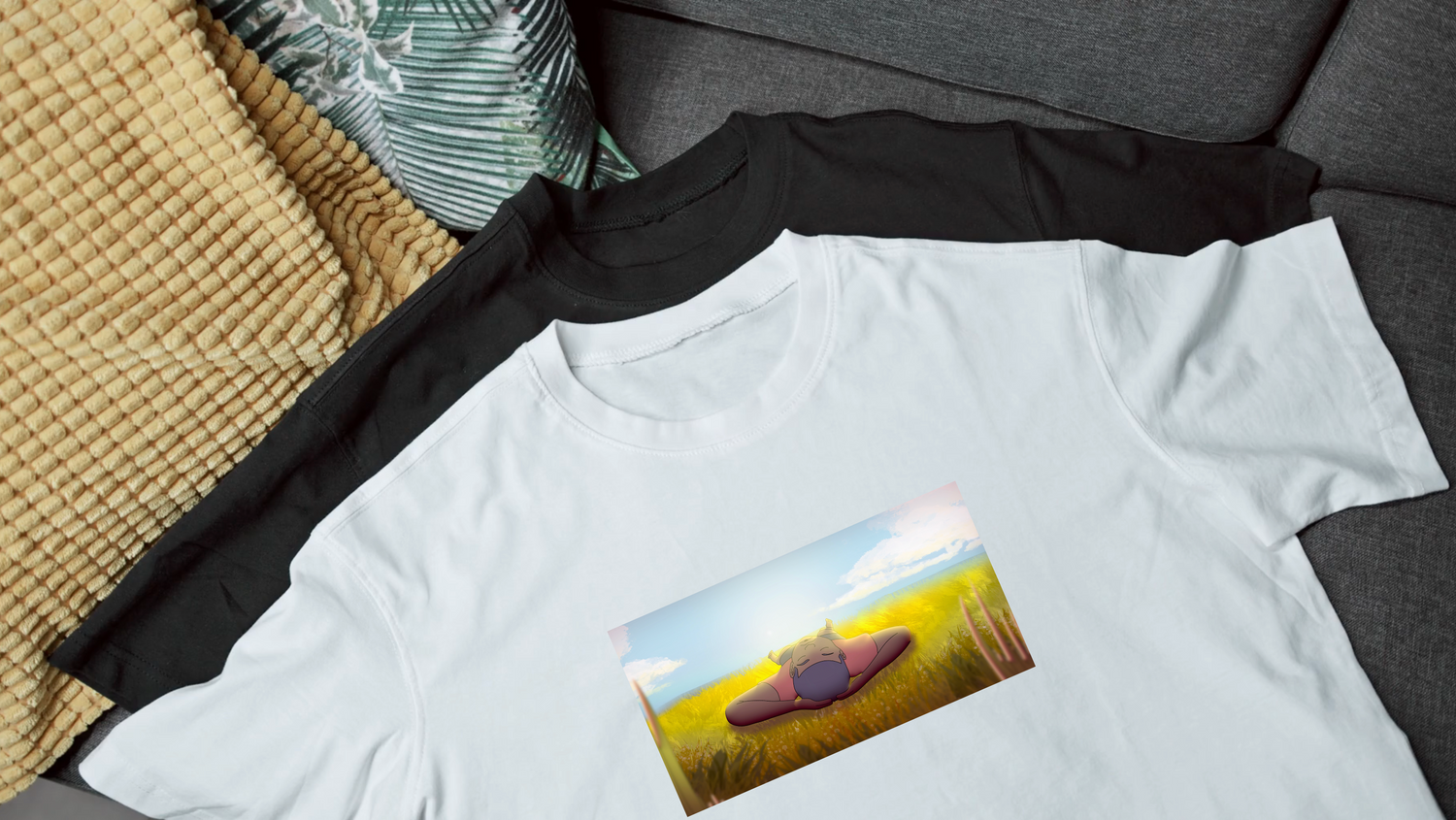 White t-shirt with a graphic design on a gray surface